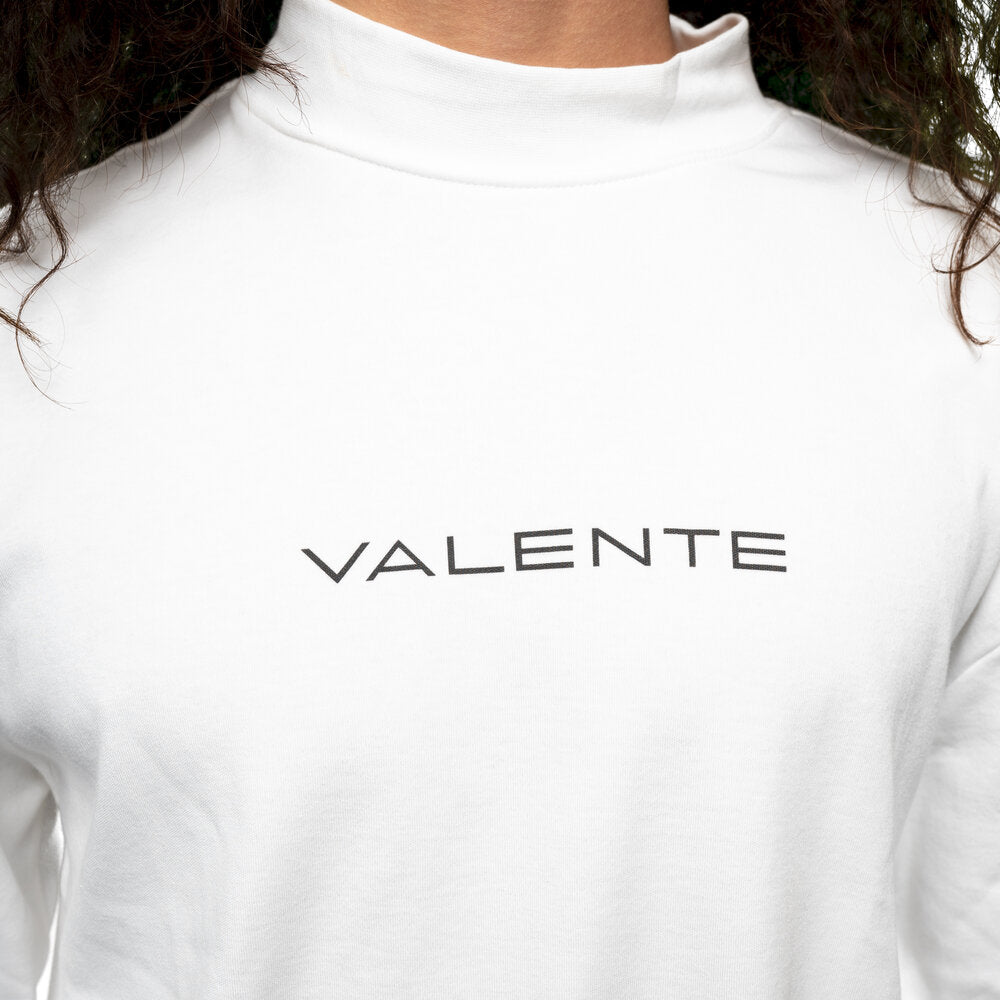 
                  
                    White Signature Mock Neck
                  
                