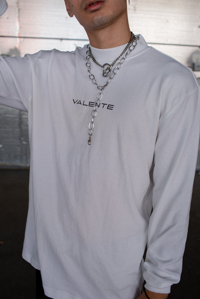 
                  
                    White Signature Mock Neck
                  
                